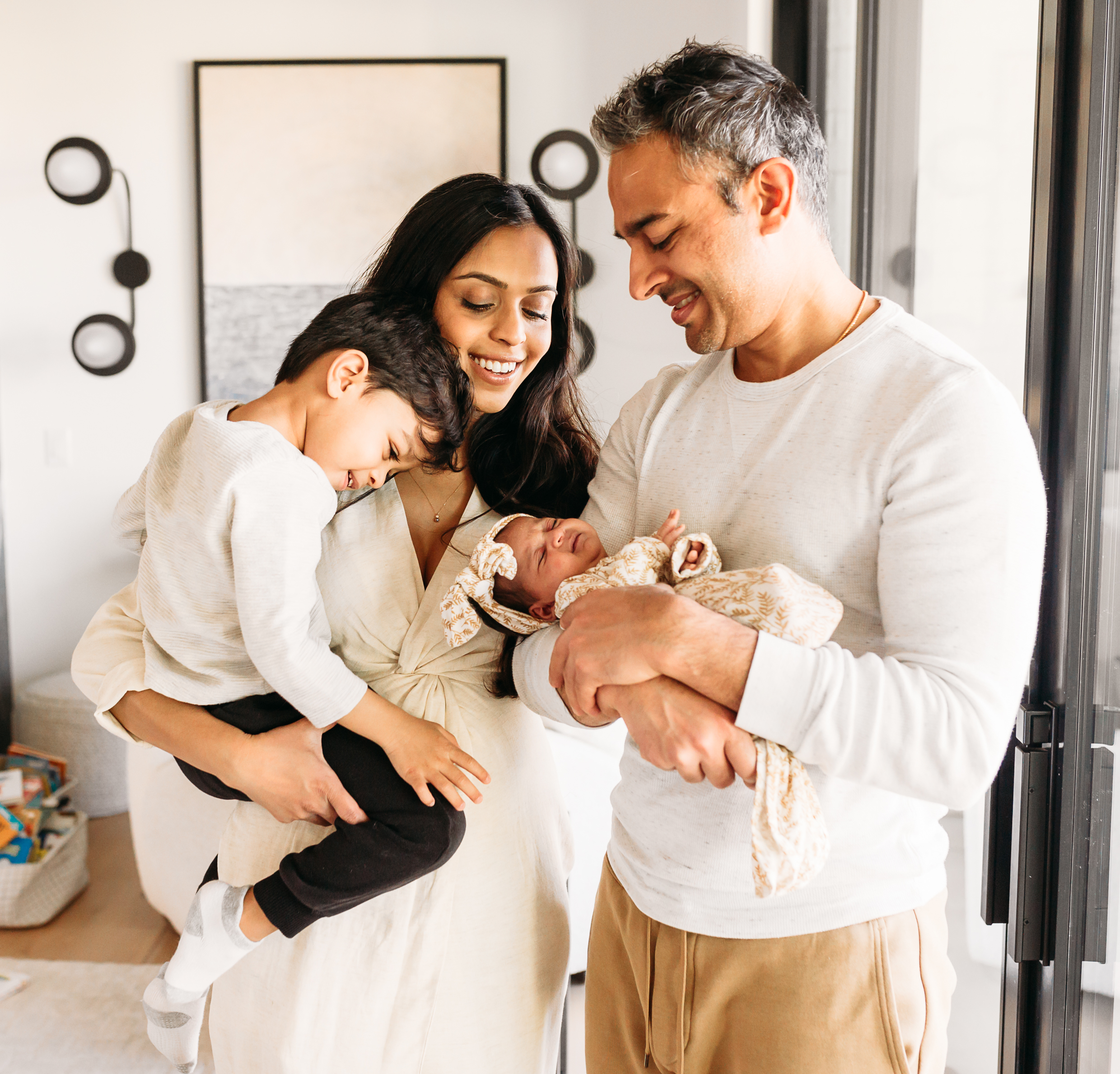 family of four with newborn