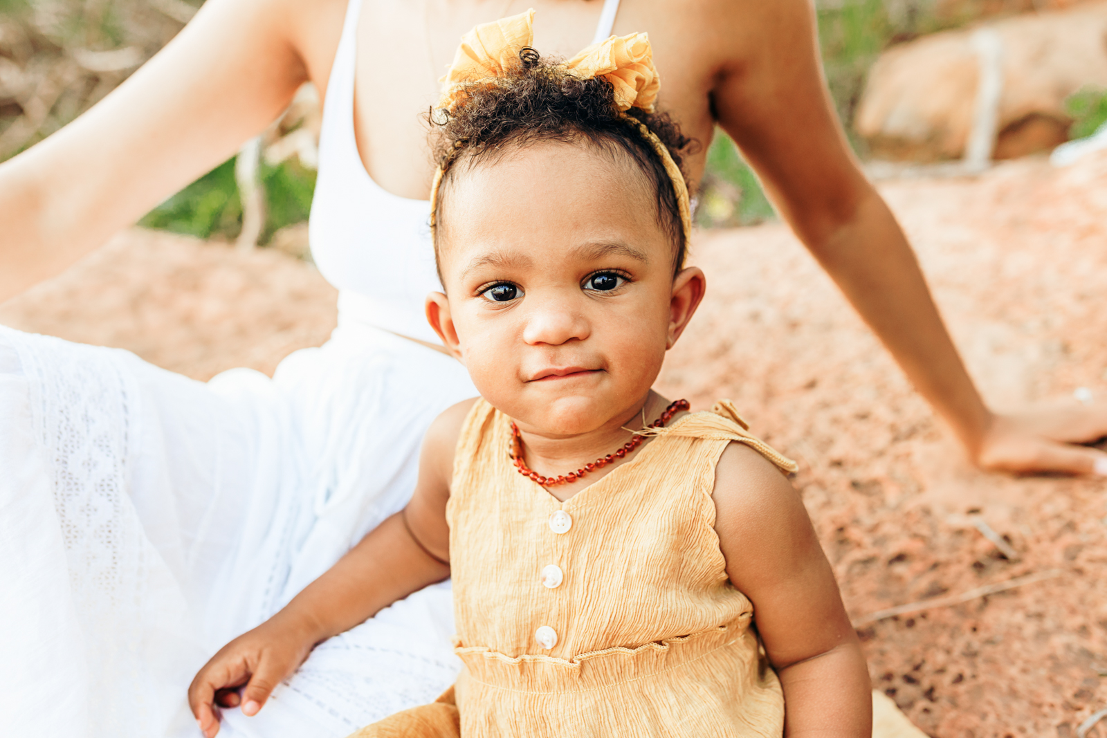 a little girl looks at camera during photo session.