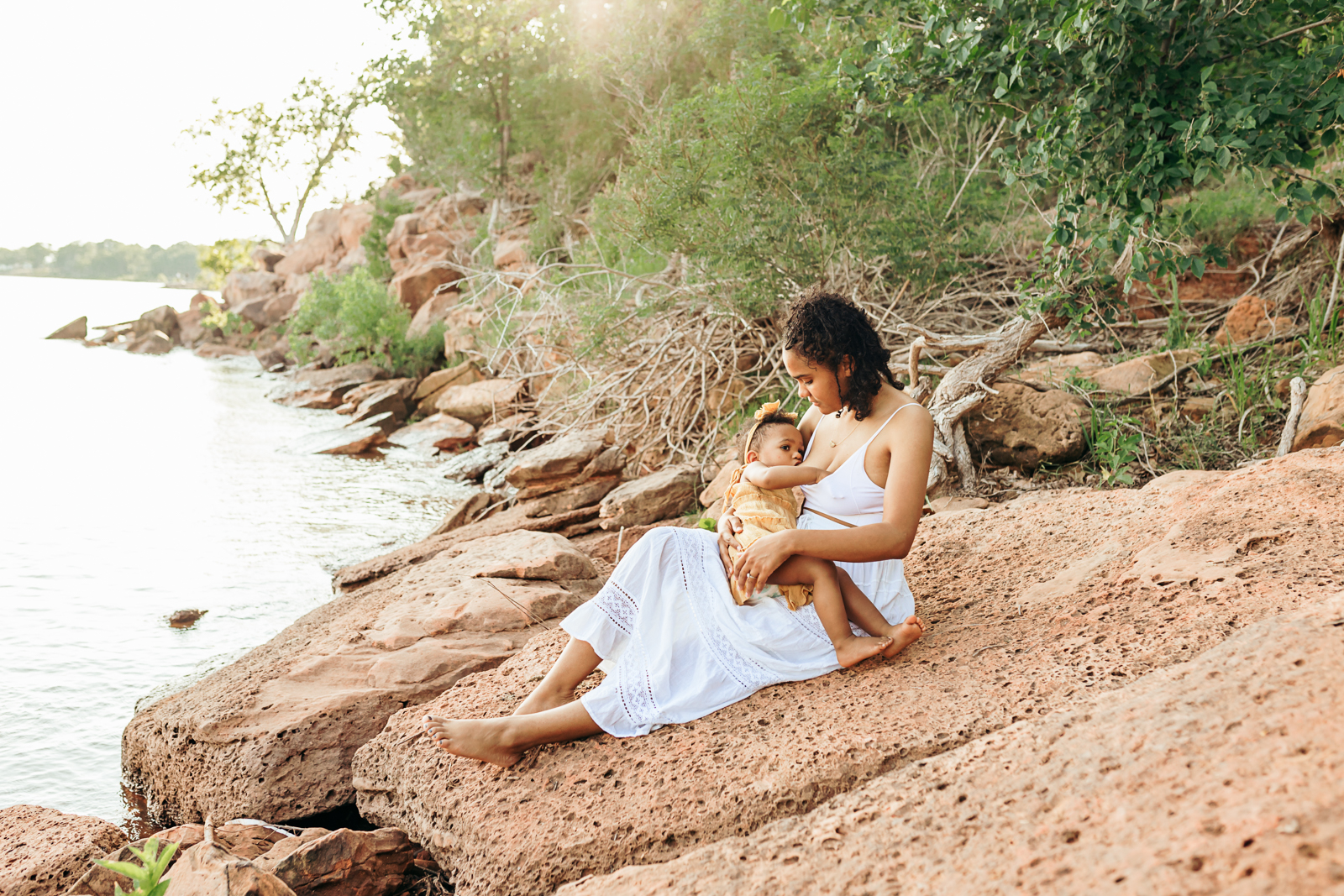 A mother nurses her baby.
