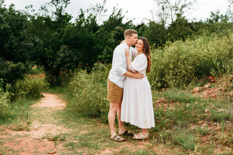 Couple at Lake Arcadia during maternity photo session.