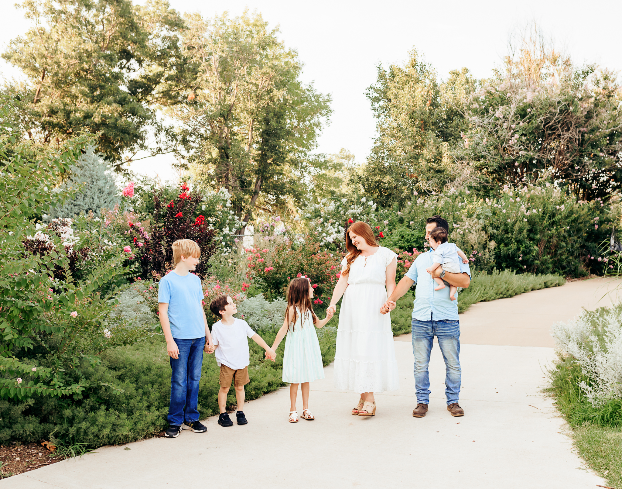Family of five during family photo session at Will Rogers Gardens in Oklahoma City, OK.
