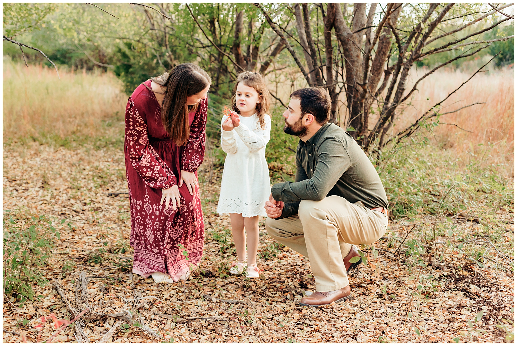 Mom poses at Myriad Gardens in OKC maternity photos.