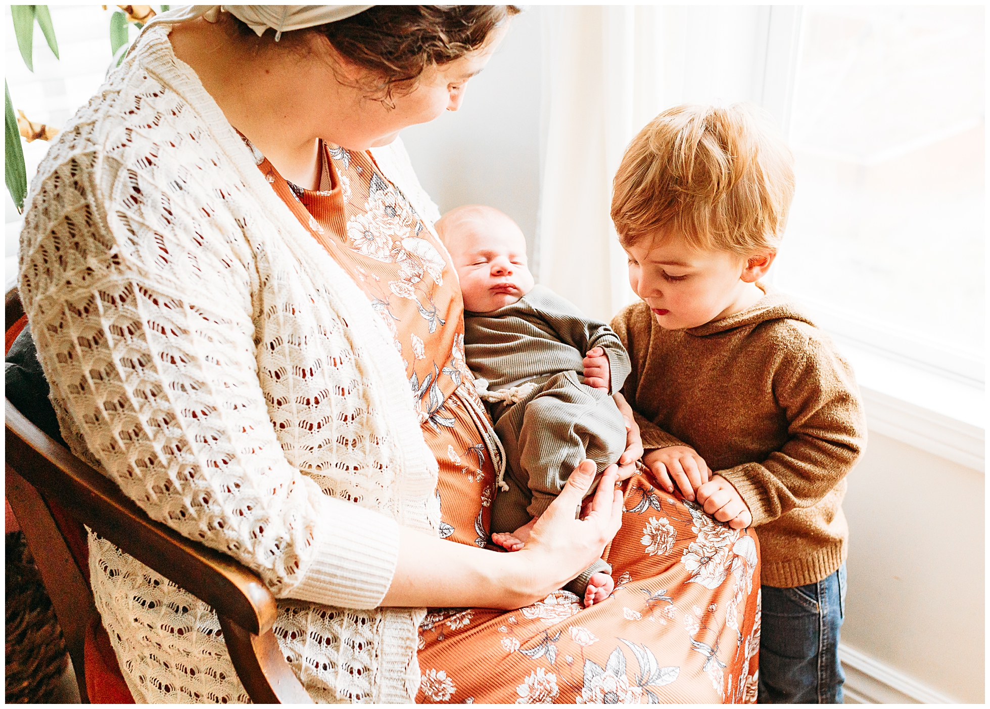 A mother nurses her baby.