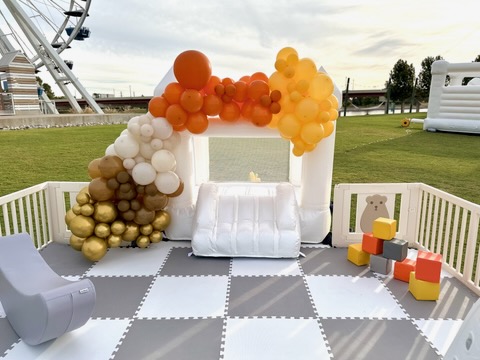 a mom and dad hold newborn during photo session