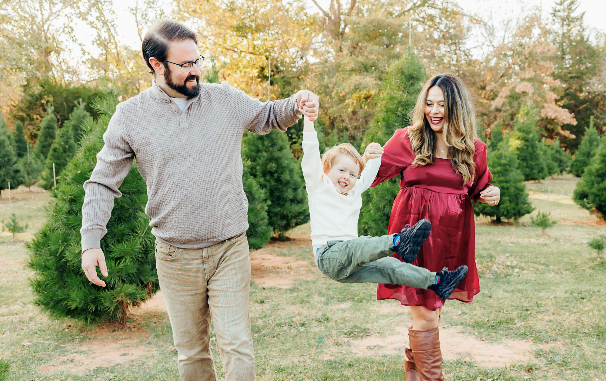 Couple with newborn baby at Lakeside Women's Hospital in OKC during fresh 48 photo session.