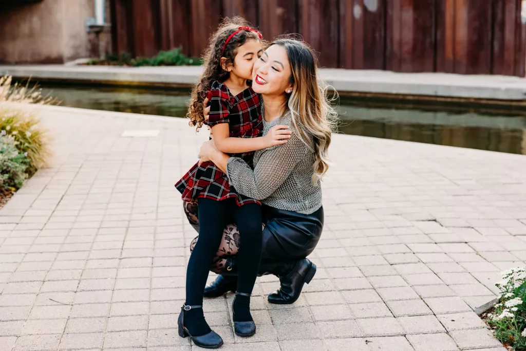 Mom and Daughter together during family photos.