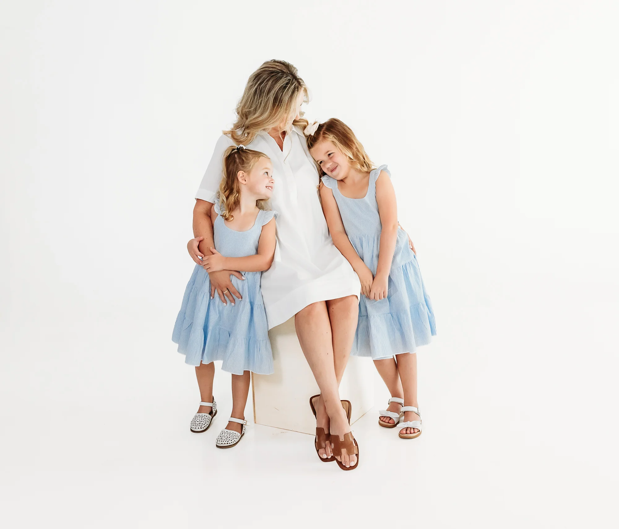 A mom and her daughters at Ren Studio during OKC motherhood photo sessions.