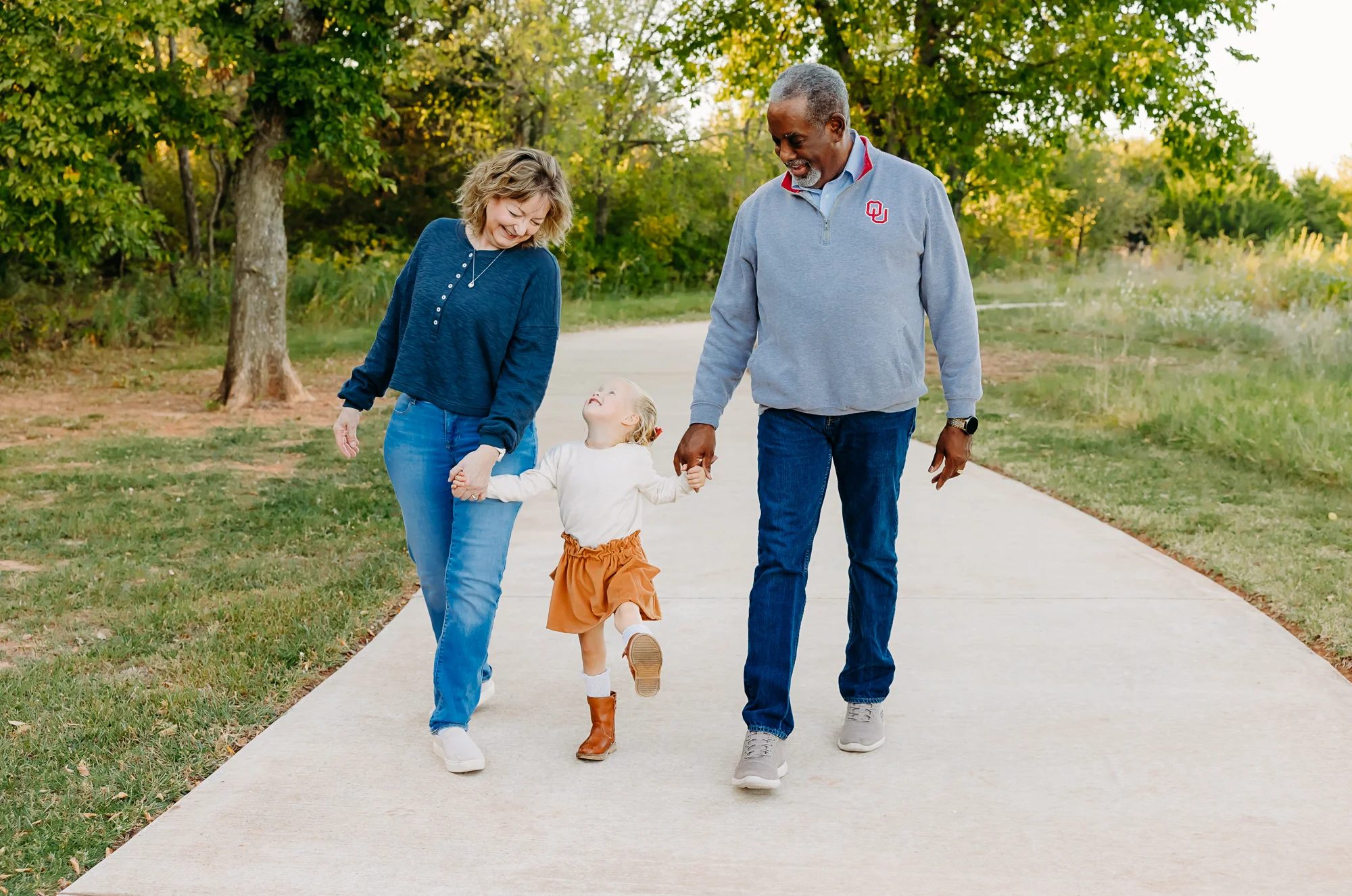 A family in OKC plays during an in home photo session.