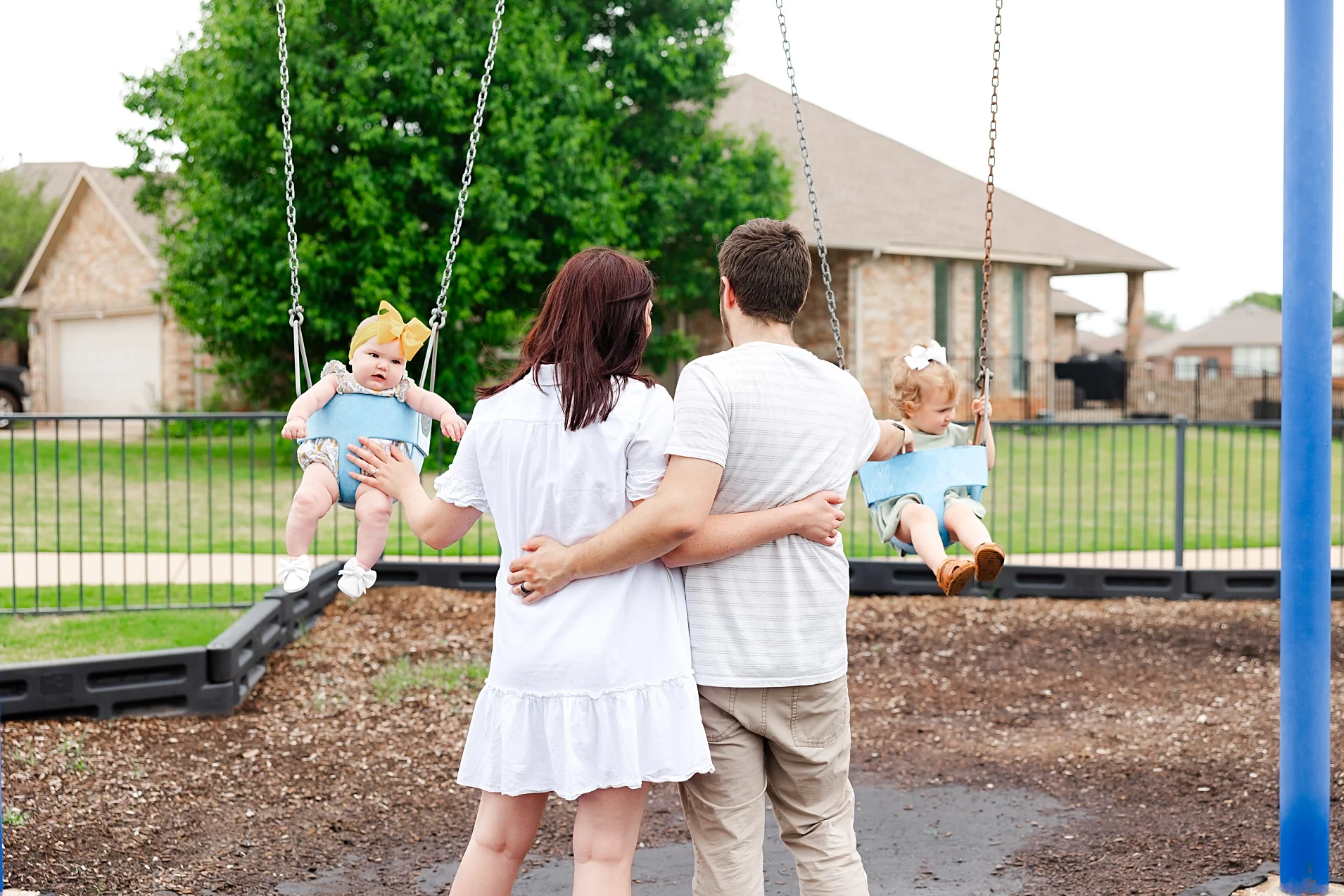 Couple with white poodle during newborn session in Oklahoma City