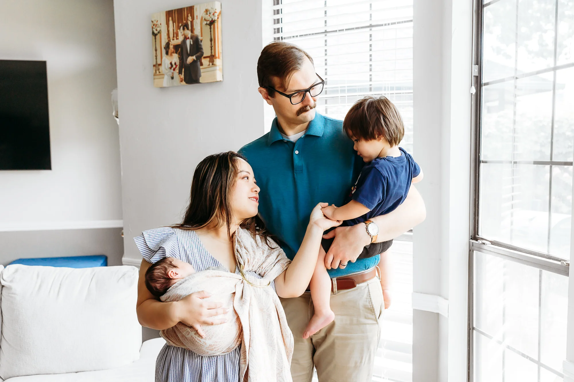 Family of 5 during newborn photo session in OKC.