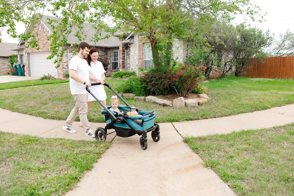 Mom, Dad and toddlers walk to the park.
