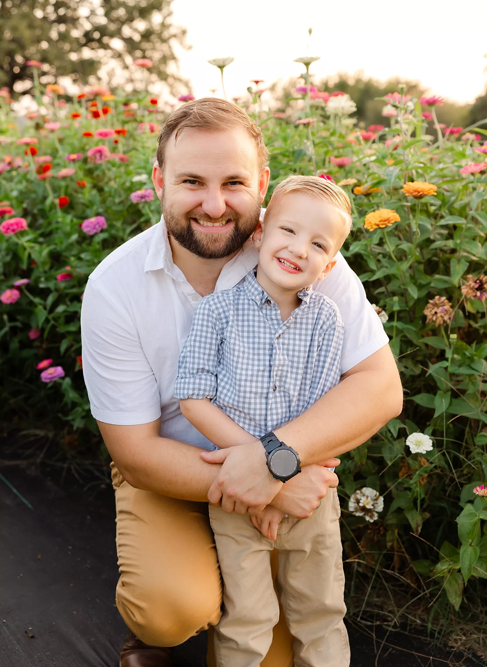 dad and his son during golden hour family photos in oklahoma city.