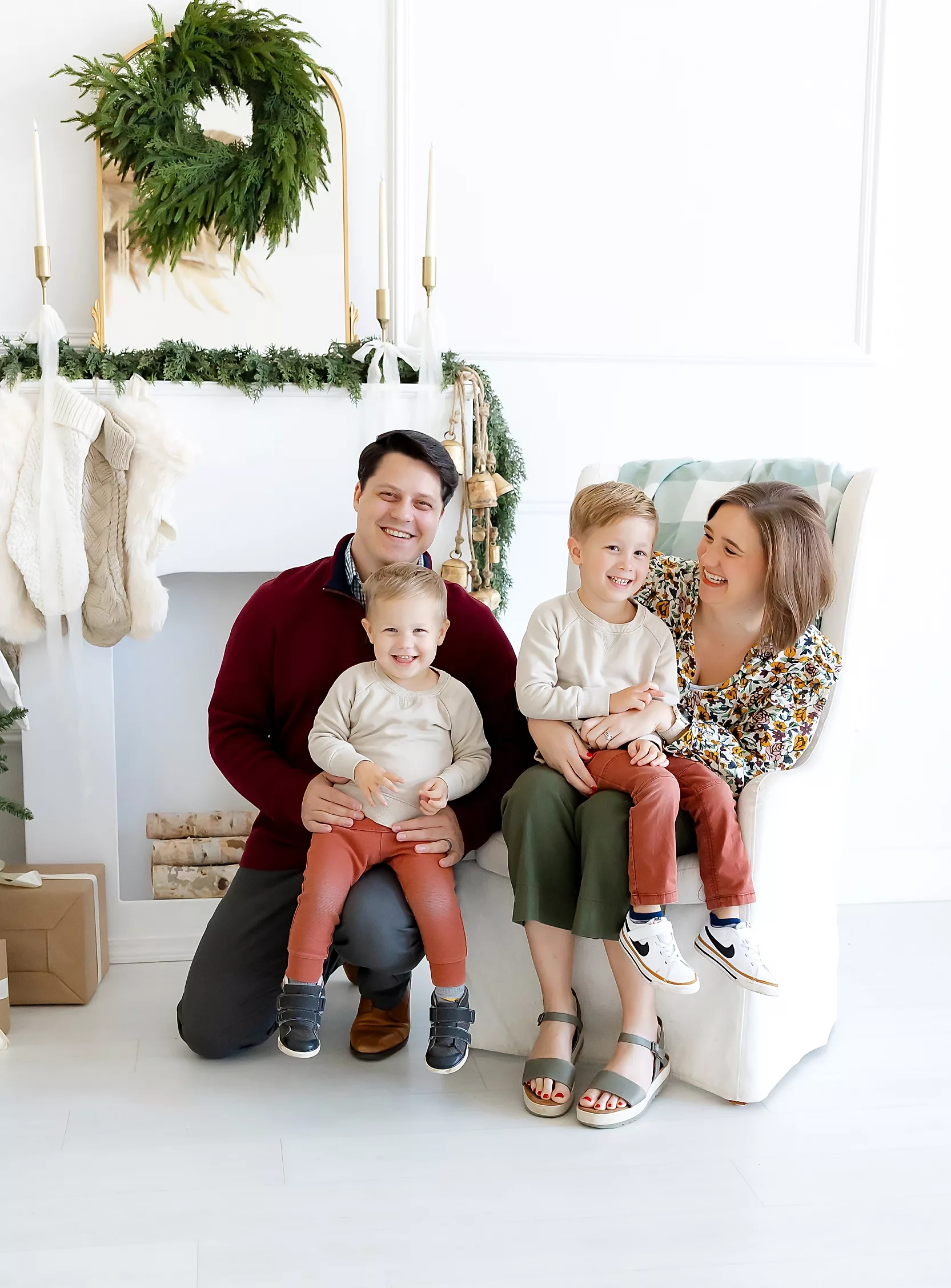 Mom and toddler read a book together during an at home family photo session in Oklahoma City.