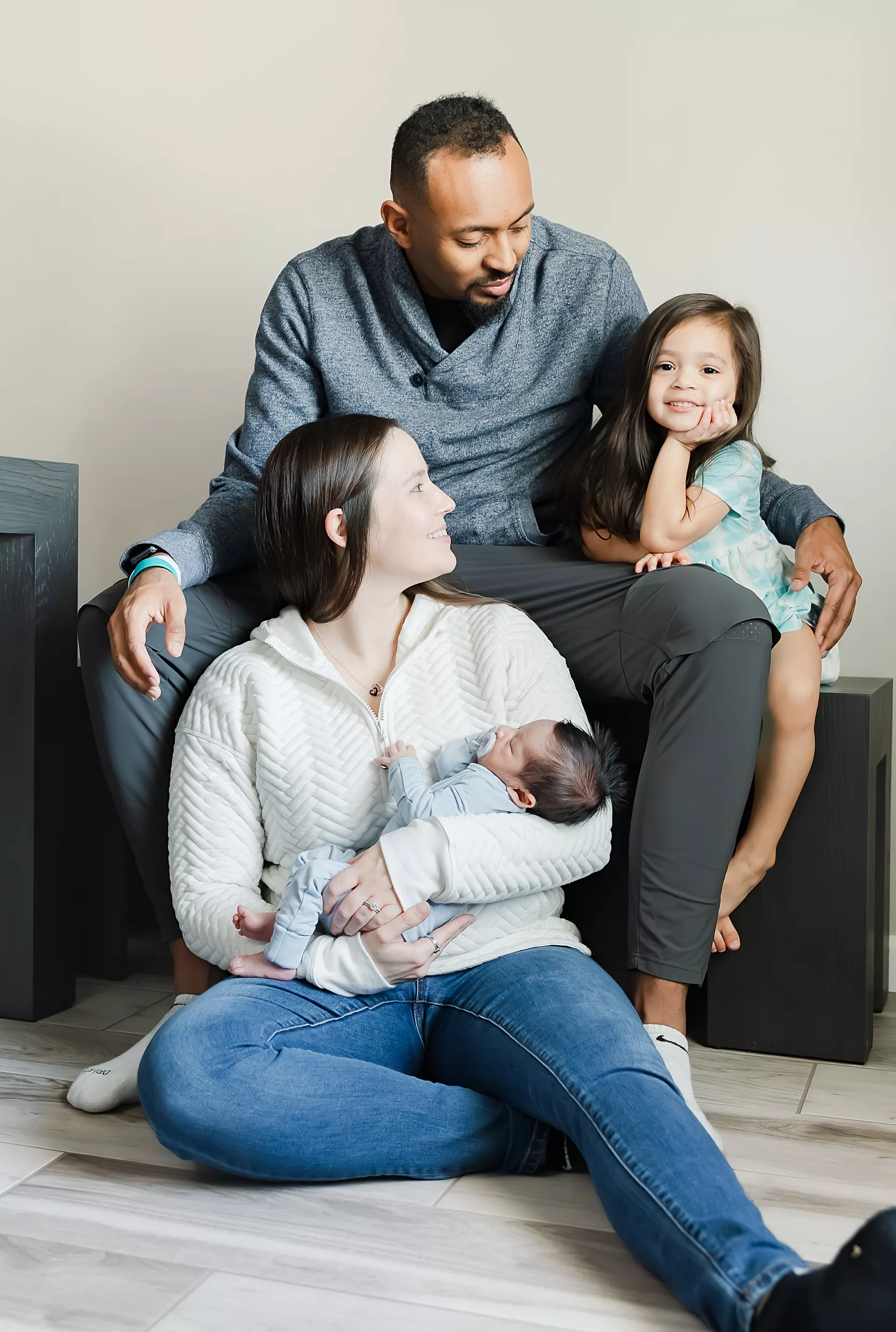 New baby lies in a hospital crib during a oklahoma city Fresh 48 photography session.