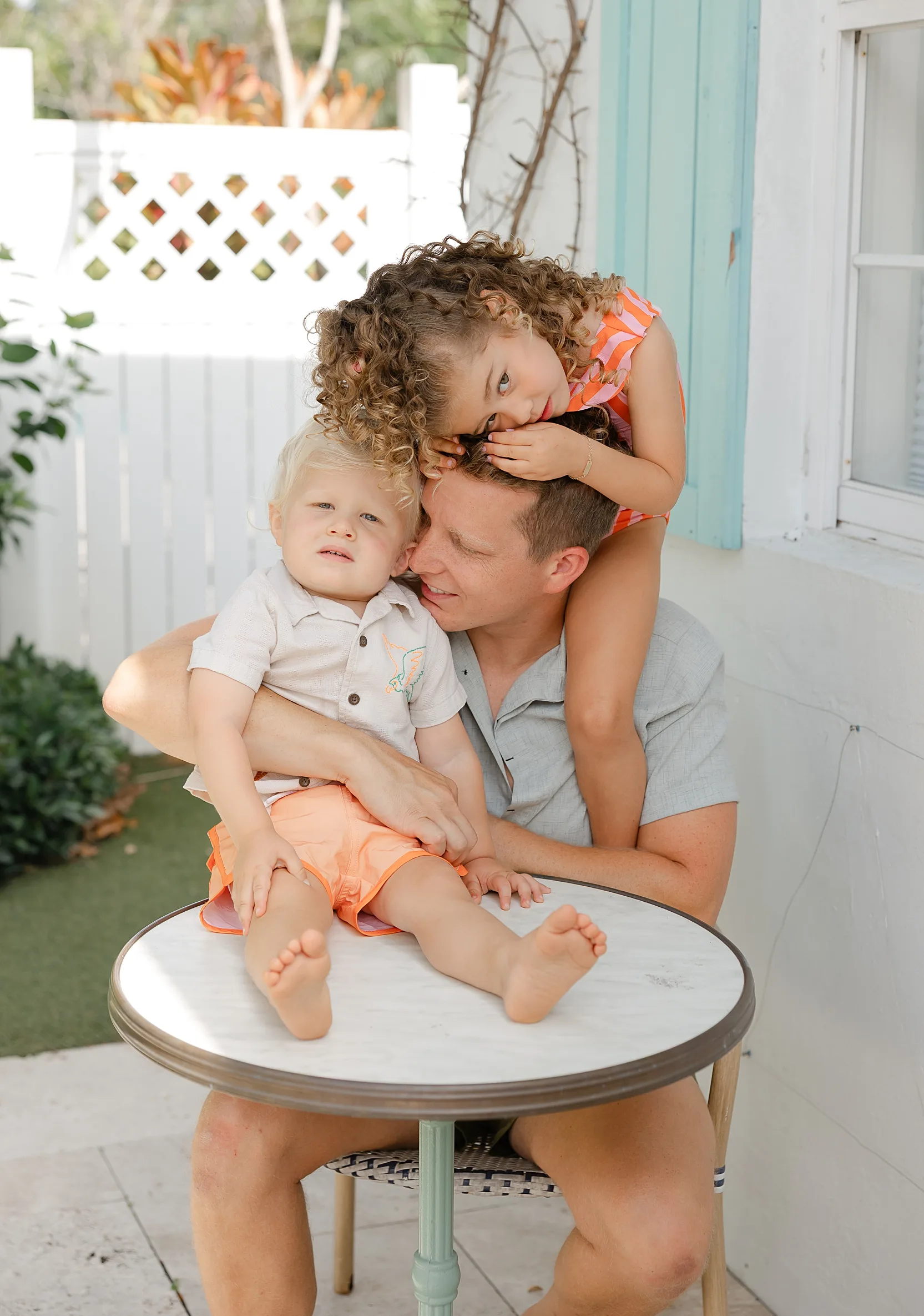 mood board of pinks and neutrals for what to wear for spring family photos in OKC