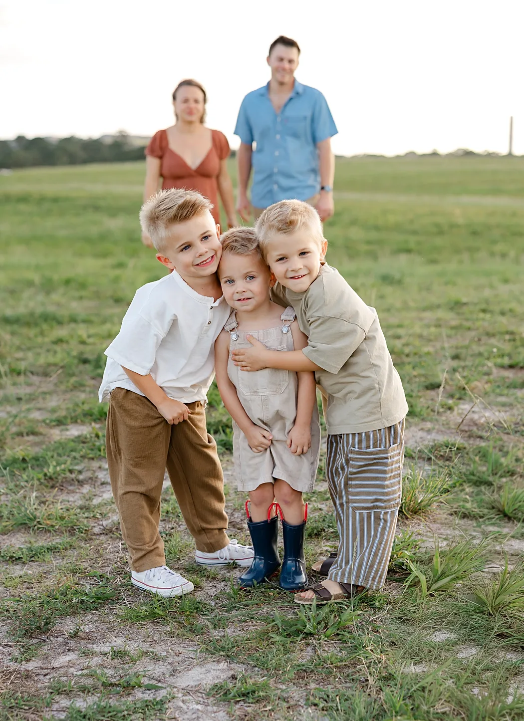 mood board of pinks and neutrals for what to wear for spring family photos in OKC